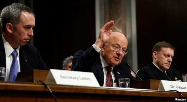 FILE - Director of National Intelligence James Clapper testifies before a Senate Armed Services Committee hearing on foreign cyber threats, on Capitol Hill in Washington, Jan. 5, 2017.