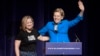 Elizabeth Warren, United States senator from Massachusetts and one of the many Democrats running for president in 2020, enters the stage with San Juan Mayor Carmen Yulin Cruz Soto at the Alejandro Tapia y Rivera Theater, in San Juan, Puerto Rico, Jan. 22, 2019.