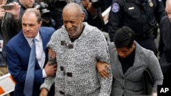 Bill Cosby arrives at court to face a felony charge, Wednesday, Dec. 30, 2015, in Elkins Park, Pa. Cosby was charged Wednesday with drugging and sexually assaulting a woman at his home 12 years ago. (AP Photo/Matt Rourke)