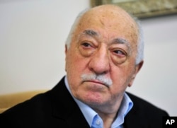 FILE - Islamic cleric Fethullah Gulen speaks to reporters at his compound in Saylorsburg, Pa., July 2016.