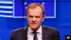 European Council President Donald Tusk speaks during a media conference on Brexit at the Europa building in Brussels, March 20, 2019.