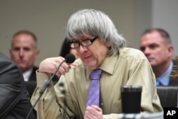 David Turpin becomes emotional as he reads a statement during a sentencing hearing, April 19, 2019, in Riverside, Calif. Turpin and his wife, Louise, pleaded guilty of neglect and abuse of 12 of their 13 children.