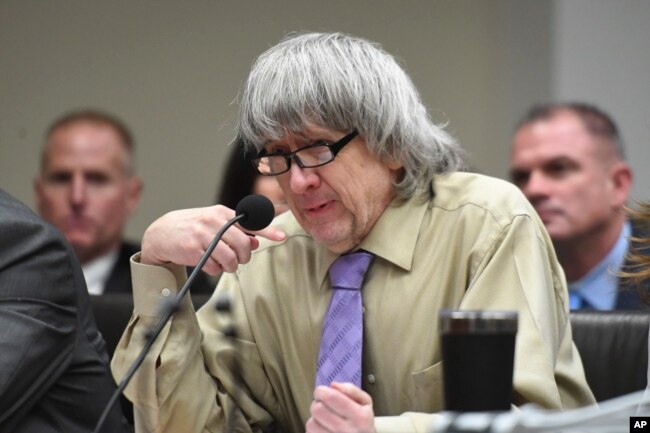 David Turpin becomes emotional as he reads a statement during a sentencing hearing, April 19, 2019, in Riverside, Calif. Turpin and his wife, Louise, pleaded guilty of neglect and abuse of 12 of their 13 children.