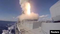 A still image taken from a video footage and released by Russia's Defense Ministry on Nov. 15, 2016, shows cruise missiles being launched from Russian Admiral Grigorovich frigate deployed off Syria coast. 