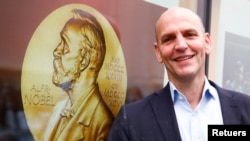 German scientist Benjamin List, who shares the 2021 Nobel Prize in Chemistry together with David MacMillan for the development of asymmetric organocatalysis, poses at the Max-Planck-Institute for Coal Research in Muelheim an der Ruhr, Germany, October 6, 