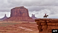 A Navajo man on a horse in front of the Merrick Butte in Monument Valley Navajo Tribal Park, Utah, on May 16, 2015.