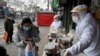中国新增病例下降，世卫担忧疫情蔓延