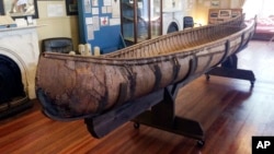 One of the oldest-known Native American birch-bark canoes, dated from the mid-1700's, is displayed at the Pejepscot Museum & Research Center in Brunswick, Maine, Oct. 5, 2017. 