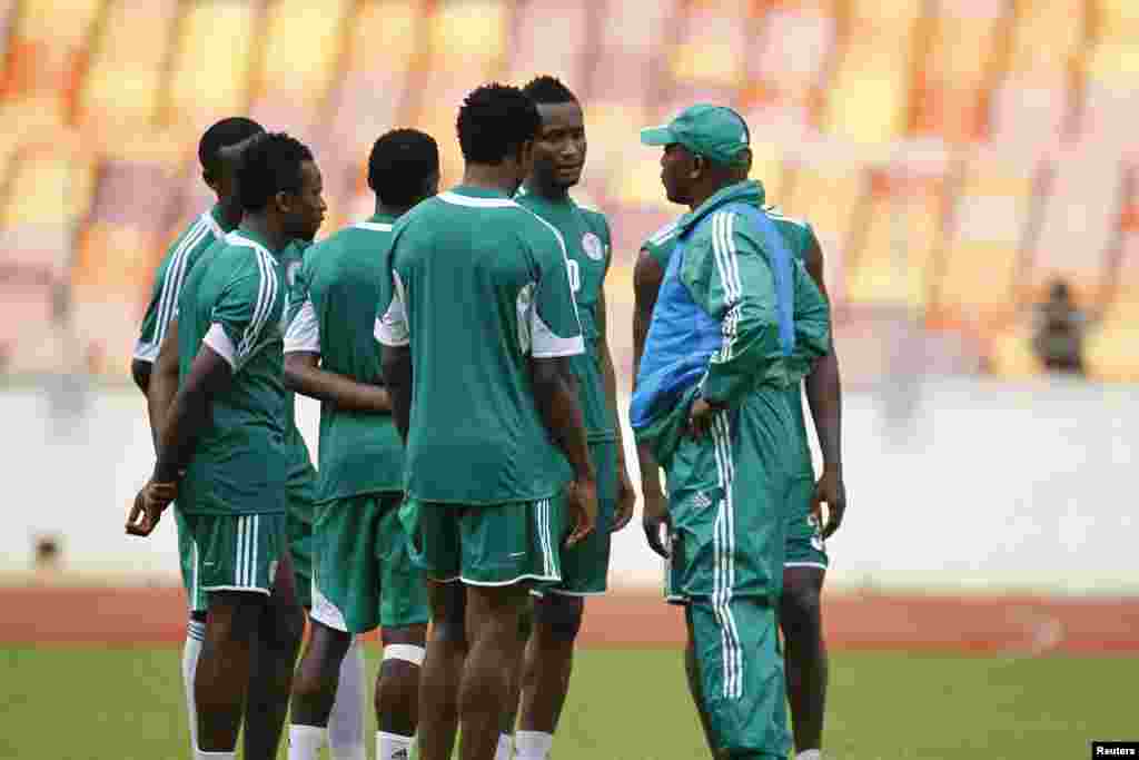 Coach Stephen Keshi speaks to members of the Super Eagles at practice in Abuja before their World Cup qualifier against Ethiopia.