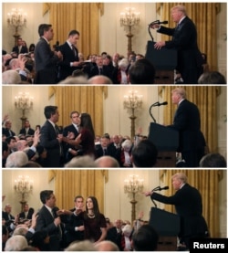 A White House staff member reaches for the microphone held by CNN's Jim Acosta during a Nov. 7, 2018 news conference, in a combination of photos at the White House.