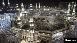 Muslim pilgrims circle the Kaaba and pray at the Grand mosque during the annual haj pilgrimage in the holy city of Mecca, October 22, 2012.