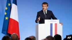 French President Emmanuel Macron addresses French Ambassadors at the Elysee Palace in Paris, Aug. 29 2017. 