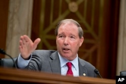 Ranking Member Sen. Tom Udall, D-New Mexico, questions EPA Administrator Scott Pruitt as he testifies before a Senate Appropriations subcommittee on Capitol Hill in Washington, May 16, 2018.