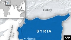 Lực lượng an ninh Syria bị cáo buộc sát hại 10 người ở Homs