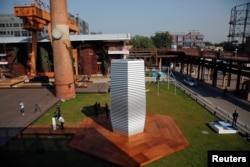 The Smog Free Tower, the world's largest smog vacuum cleaner designed by Dutch artist and innovator Daan Roosegaarde is seen at former industrial zone, now D-751 art district, as the artist presents his The Smog Free Project in Beijing, Sept. 29, 2016.