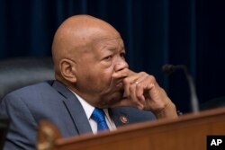 Rep. Elijah E. Cummings, the chairman of the Committee on Oversight and Reform, presides over the last hour of testimony by Michael Cohen, President Donald Trump's former personal lawyer, on Capitol Hill in Washington, Feb. 27, 2019.