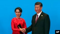 资料照：中国国家主席习近平在北京会见到访的缅甸领导人昂山素季。（2017年5月15日）