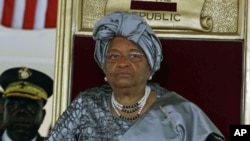 Liberian President Ellen Johnson-Sirleaf sits at a ceremony to mark her second presidential inauguration at the Capitol in Monrovia, Liberia, January 16, 2012.