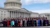 Members of the freshman class of Congress pose for a photo on Capitol Hill in Washington, Nov. 14, 2018, in Washington.