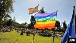 Members of the Kikuyu and Kalenjin tribes are seen gathering for a peace meeting in Eldoret, Kenya, in this June 27, 2009, file photo.