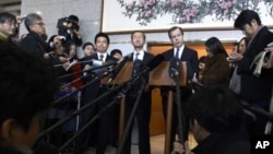 U.S. special envoy to North Korea Glyn Davies, center right, and South Korea's nuclear envoy Lim Sung-nam, center left, listen to reporters question after their meeting at the Foreign Ministry in Seoul, South Korea, December 8, 2011.