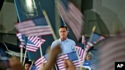 Republican presidential nominee, former Massachusetts Governor Mitt Romney addresses the audience at a rally with the GOP team at the Military Aviation Museum in Virginia Beach, Virginia, September 8, 2012.