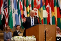 FILE - President Donald Trump delivers a speech to the Arab Islamic American Summit, at the King Abdulaziz Conference Center, May 21, 2017, in Riyadh, Saudi Arabia.