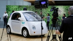 The Waymo driverless car is displayed during a Google event, Tuesday, Dec. 13, 2016, in San Francisco.