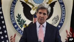 U.S. Senator John Kerry gestures, as he speaks during a press conference at the U.S. embassy in Kabul, Afghanistan, Sunday, May 15, 2011. (AP Photo/Musadeq Sadeq)