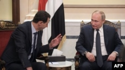 Arhiv - Ruski predsjednik Vladimir Putin i sirijski predsjednik Bashar al-Assad održali su sastanak u Damasku 7. januara 2020.