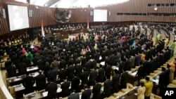 FILE - New members of Indonesia's parliament gather to be sworn in during their inauguration at the parliament building in Jakarta, Indonesia, Oct. 1, 2014. 