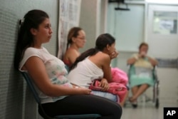 FILE - Six-weeks pregnant Daniela Rodriguez, 19, waits for test results after being diagnosed with the Zika virus at Erasmo Meoz Hospital in Cucuta. Norte de Santander state has Colombia's highest Zika virus cases, Feb. 11, 2016.