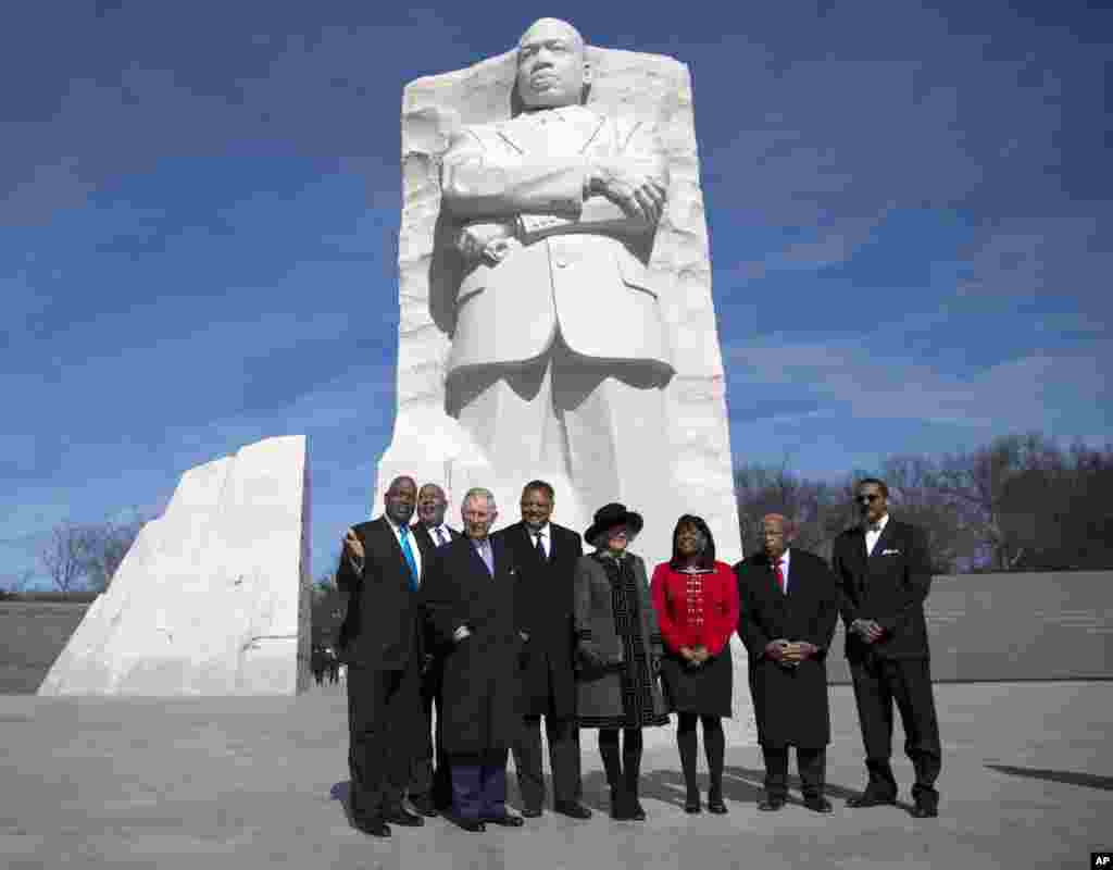 Britain&#39;s Prince Charles and his wife, Camilla, the Duchess of Cornwall are accompanied by several invited guests on A tour of the Martin Luther King, Jr. Memorial in Washington, March 18, 2015.