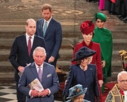 Ratu Inggris Elizabeth II, Pangeran Charles, Camilla, Duchess of Cornwall, Pangeran William dan Catherine, Duchess of Cambridge, Pangeran Harry dan Meghan, Duchess of Sussex menghadiri Commonwealth Service tahunan di Westminster Abbey di London, Inggris 9