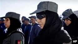 Afghan policewomen attend their graduation ceremony in Herat, west of Kabul, Afghanistan