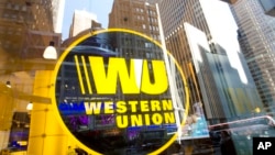 Layanan pengiriman uang, Western Union di sebuah gerai di New York, AS, 5 April 2016. (Foto: dok).