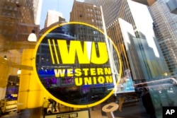 A Western Union store in New York, April 5, 2016. in New York. Late last year the Burma Campaign UK pressure group published a list of 49 foreign companies it said were doing business with the military or implicated in rights abuses in Myanmar.