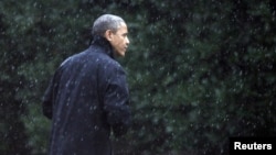 Барак Обама возвращается в Белй Дом. Вашингтон, Округ Колумбия. 29 октября 2012 года