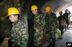 South Korean soldiers visit the 2nd Underground Tunnel, found in 1975 near the city of Cheorwon, on Sept. 18, 2008.