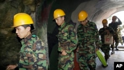 South Korean soldiers visit a tunnel found in 1975 near Cheorwon, on Sept. 18, 2008.