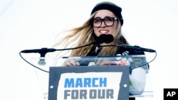 Delaney Tarr, a survivor of the mass shooting at Marjory Stoneman Douglas High School in Parkland, Florida, speaks during the "March for Our Lives" rally in support of gun control in Washington, March 24, 2018.