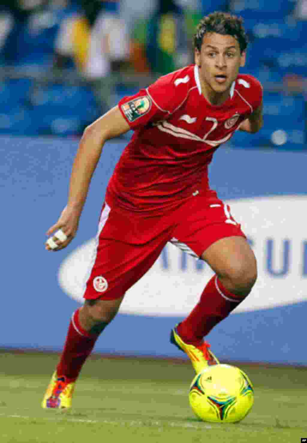 Tunisia's Msakni dribbles the ball during their African Cup of Nations soccer match against Niger in Libreville