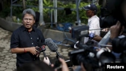 Todung Mulya Lubis, lawyer for two Australians facing death penalty, Myuran Sukumaran and Andrew Chan, speaks to reporters at Wijayapura port in Cilacap, Central Java island, Indonesia, April 27, 2015.