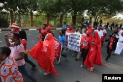 Members of the #BringBackOurGirls campaign rally in Nigeria's capital, Abuja, to mark 1,000 days since over 200 schoolgirls were kidnapped from their secondary school in Chibok by Islamist sect Boko Haram, Jan. 8, 2017.