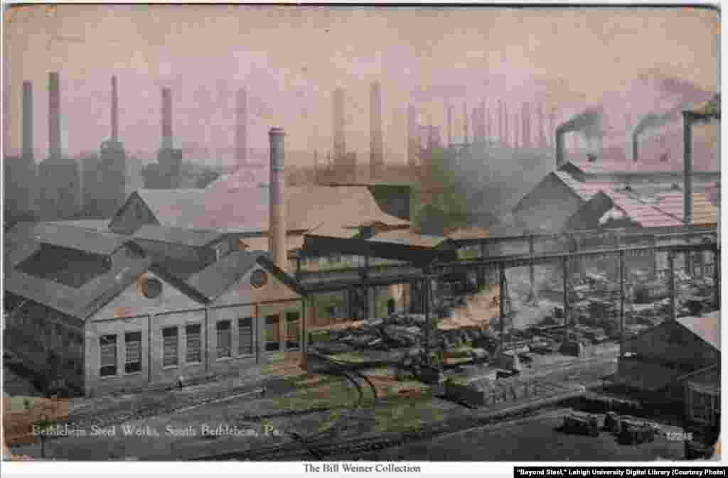 View of Bethlehem Steel plant with train engine and cars, Bethlehem, Pennsylvania, sometime between 1907-1914.