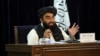 Пресс-секретарь Талибана Забиулла Муджахид на пресс-конференции в Кабуле 7 сентября 2021 г. объявил о временном кабинете