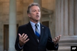 Sen. Rand Paul, R-Ky., speaks during a television interview on Capitol Hill in Washington, July 17, 2018, as he defends President Donald Trump and his Helsinki news conference with Russian President Vladimir Putin.