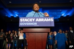 FILE - Georgia Democratic gubernatorial candidate Stacey Abrams speaks to supporters about her expectations of a run-off during an election night watch party, Nov. 6, 2018, in Atlanta.