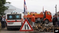 Local Serbs block access to border crossing in Jarinje on Kosovo-Serbia border to protest against Kosovo special police units operation overnight to take control of two disputed border crossings in Kosovo's northern Serb-run border region, July 26, 2011