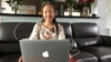 Vietnamese blogger-activist Mother Mushroom speaks with a reporter during a video conference on her laptop in Houston, Texas. 